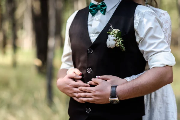 The bride hugging the groom — Stock Photo, Image