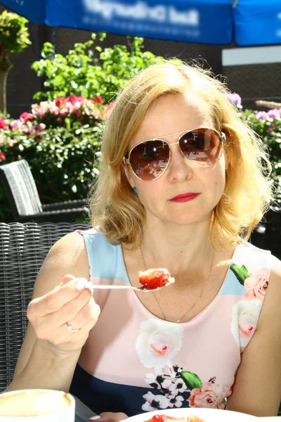 Portrait Woman Eating Strawberry Cake Stock Photo