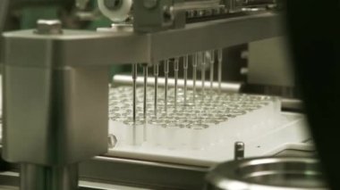 medical research implant - automated experiments- A medical laboratory or clinical laboratoryResearchers at work