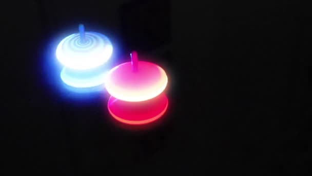 Spinning Tops Black Table — Stock video