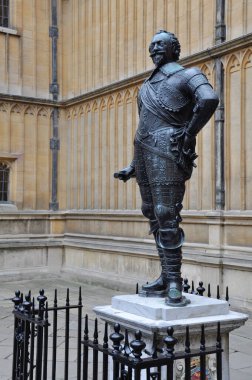 Close-up of Sculpture of Sir Thomas Bodley within the Bodleian library courtyard, Oxford, United Kingdom. Selective focus.