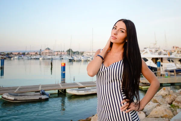 Beautiful attractive woman on yachts background — Stock Photo, Image