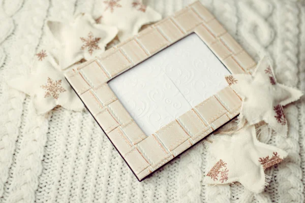 Close up picture of photography frame and decorative stars on artistic copy space background — Stock Photo, Image