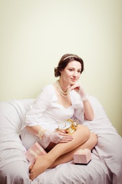 elegant beautiful young lady in white dress