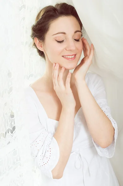 Elegant beautiful young lady in white dress — Stok fotoğraf