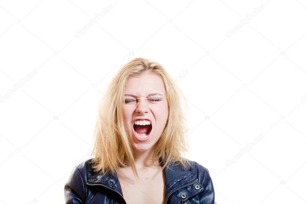 Picture of young blonde pretty woman emotionally screaming and looking at camera over light background copy space