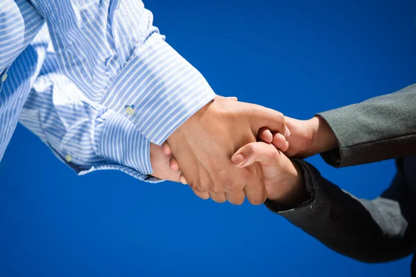 Business people handshaking on sunny day outdoors background, close-up picture — Stock Photo, Image