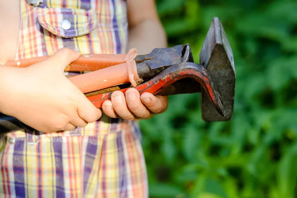 Little funny kid with building tools, closeup picture — Zdjęcie stockowe