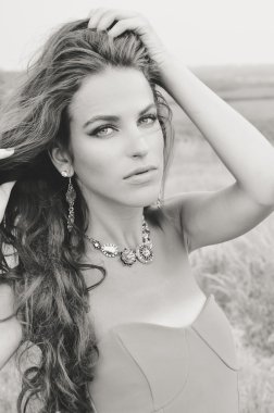 Vogue style black and white close up portrait of sensual woman