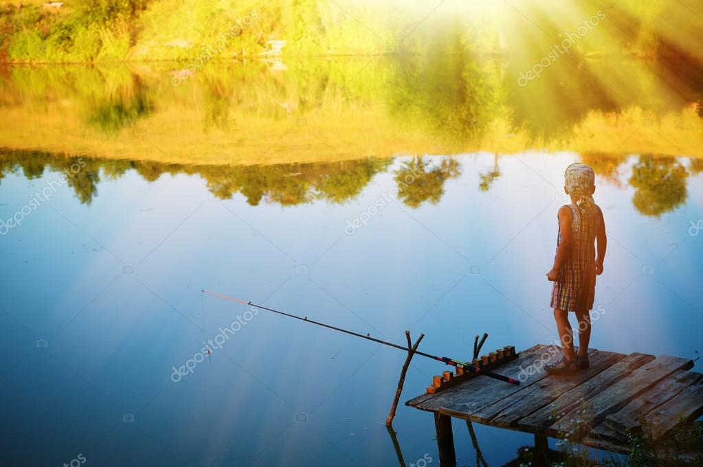 Boy And Girl With Fishing Rods Boy And Girl With Fishing Rods Fishing  Together From A Pier Photo Picture And HD Photos