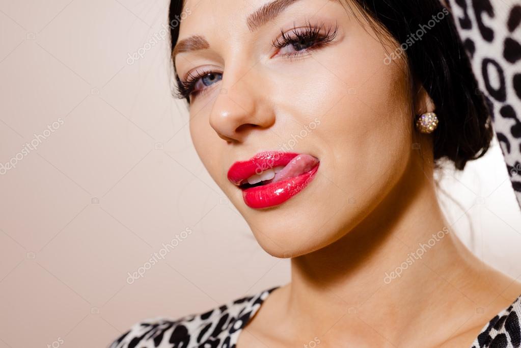 Closeup of sexy beautiful girl in animal print top licking lips Stock Photo by ©ligorosi 85369576 Closeup of sexy beautiful girl in animal print top licking lips Stock Photo by ©ligorosi 85369576