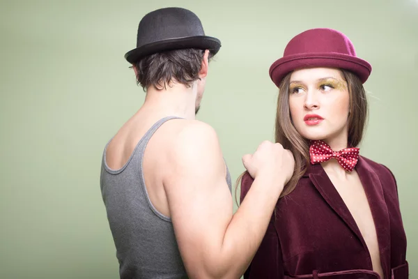 Pinup girl posing with dancer man — Stockfoto