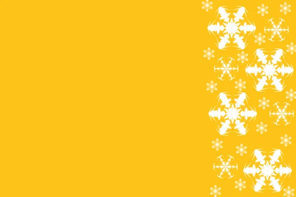 Bright yellow background with white snowflakes border on right side — Stock fotografie