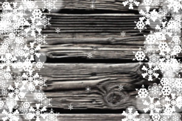 Black and white image of snowflakes borders with plank centre