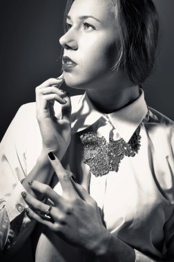 Closeup portrait of classy pretty girl in style looks thoughtfully