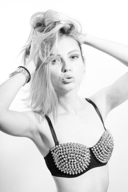 Picture of fashion beautiful blond sexy girl in spikes underwear