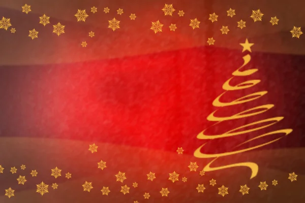 Beautiful gold spiral Christmas tree on festive red blurred background — ストック写真