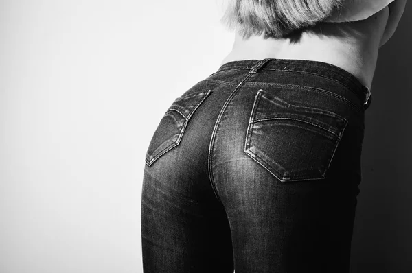 Black and white picture closeup of beautiful glamor female buttocks in jeans — Φωτογραφία Αρχείου