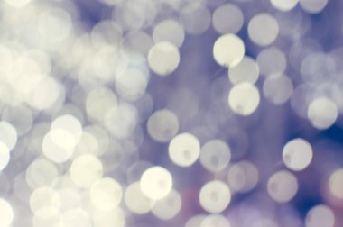 Işık arka plan beyaz bokeh ışıkları ile bulanık. Şenlikli tatil tema ile boşaltmak