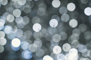 Işık arka plan beyaz bokeh ışıkları ile bulanık. Şenlikli tatil tema ile boşaltmak