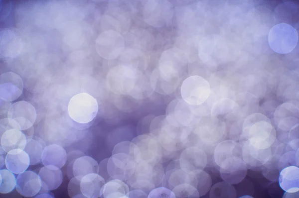 Bokeh-Illustration mit großen leuchtenden runden Lichtpunkten auf dem Hintergrundkopierraum — Stockfoto
