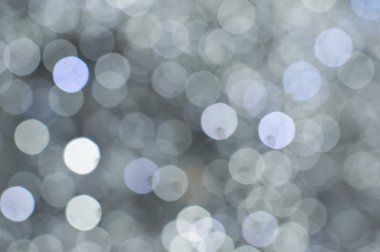 Işık arka plan beyaz bokeh ışıkları ile bulanık. Şenlikli tatil tema ile boşaltmak