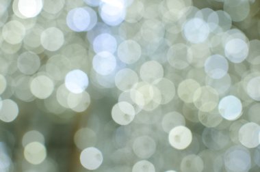 Işık arka plan beyaz bokeh ışıkları ile bulanık. Şenlikli tatil tema ile boşaltmak