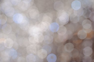 Işık arka plan beyaz bokeh ışıkları ile bulanık. Şenlikli tatil tema ile boşaltmak