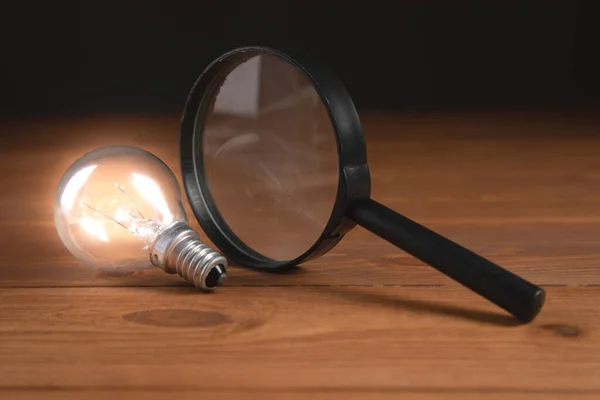 light bulb and magnifying glass search idea