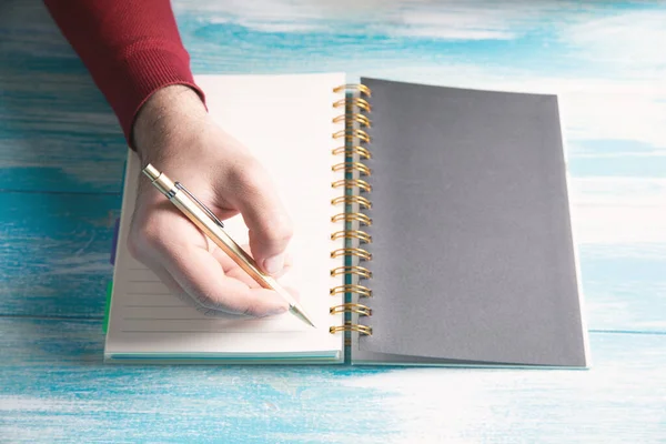 Young Man Writes Notebook — Stock Photo, Image