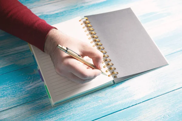 Young Man Writes Notebook — Stock Photo, Image