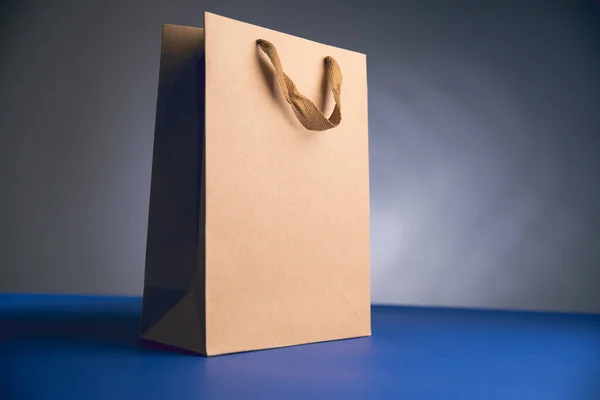 Gift Brown Bag Blue Table — Stock Photo, Image