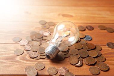 lamp and coins on the table