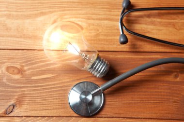 lamp and stethoscope on the table