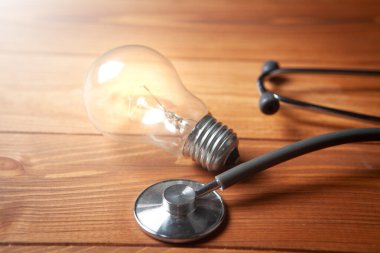 lamp and stethoscope on the table