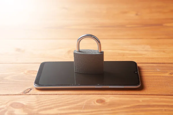 lock and phone on the table