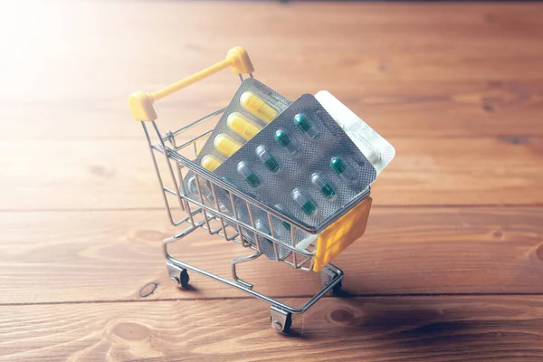 Yellow Basket Pills Wooden Background — ストック写真