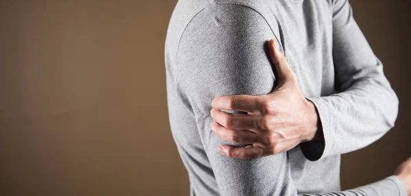 Young Man Arm Hurts — Stock Photo, Image