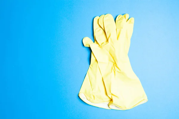Yellow Rubber Gloves Blue Background — Stock Photo, Image