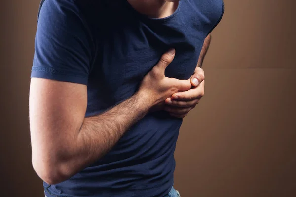 Man Has Heart Attack Heart Pain Brown Background — Stock Photo, Image