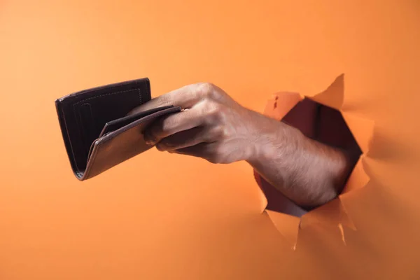 Hand Holds Wallet Orange Background — Stock Photo, Image