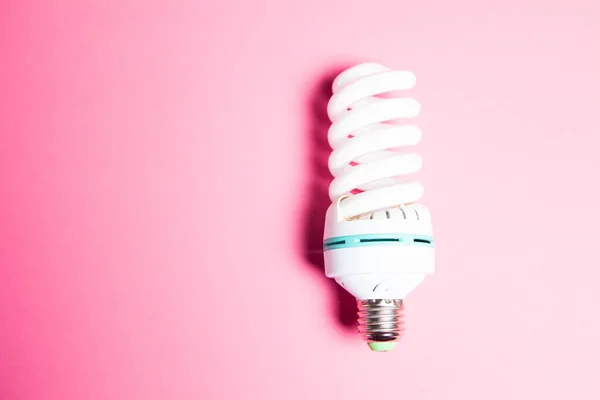 energy-saving gas lamp on pink background