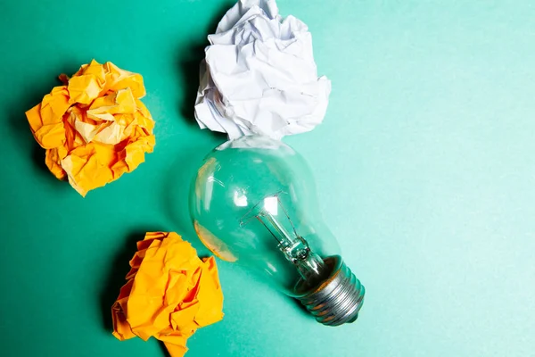 Crumpled Papers Light Bulb Blue Table — Stock Photo, Image