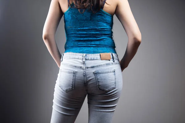 Young Girl Stands Jeans Back View — Stock Photo, Image