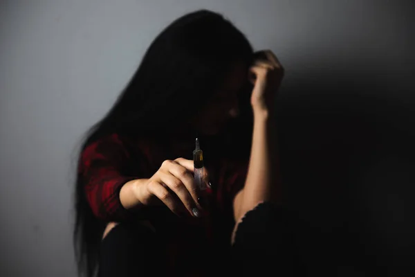 Drug Addict Sitting Floor Holding Syringe — Stock Photo, Image