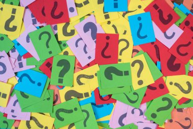 colorful paper with question mark as background. mystery,diversity,questions concept clipart