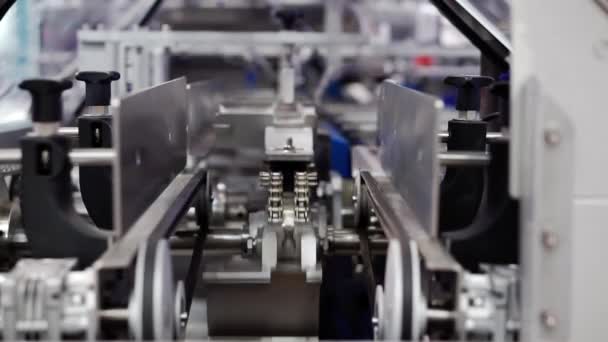 Technological background with automatic production machine. — Stock Video