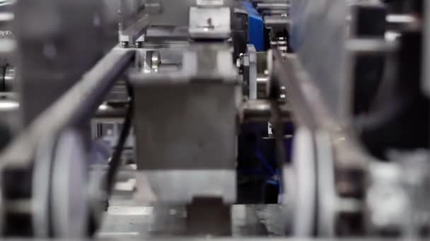 Fondo tecnológico con máquina de producción automática. — Vídeo de stock