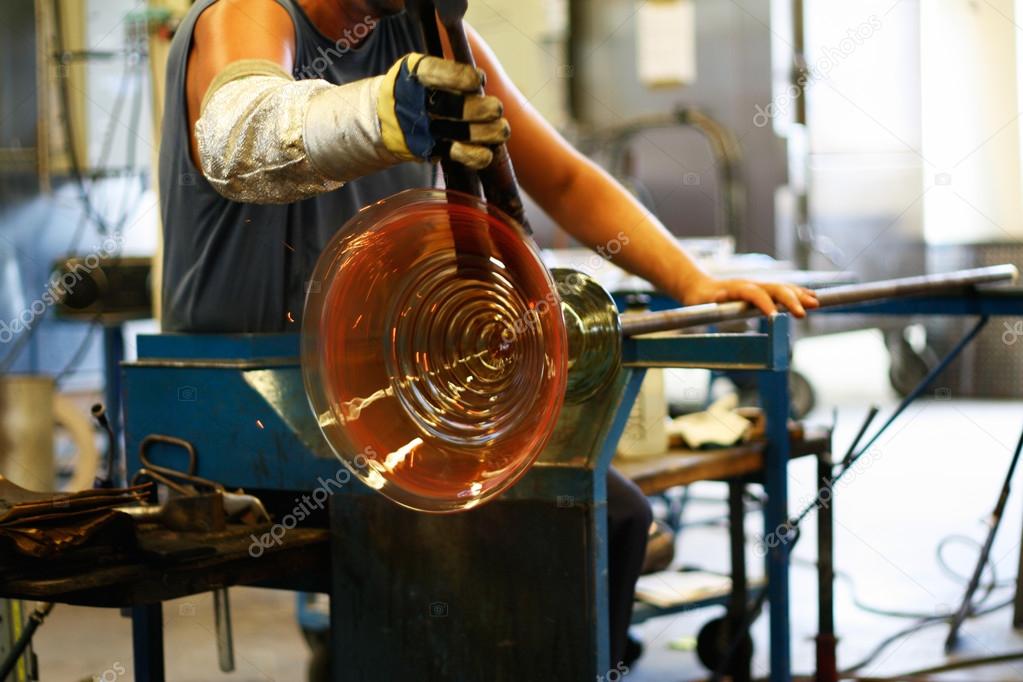 Glass blowing - shaping a vase