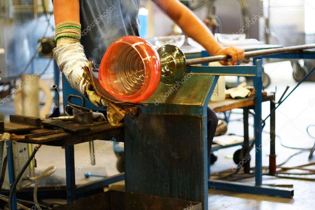 Glass blowing - shaping a vase